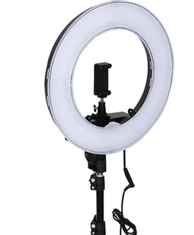 Professional 12-inch LED ring light with tripod and phone mount.