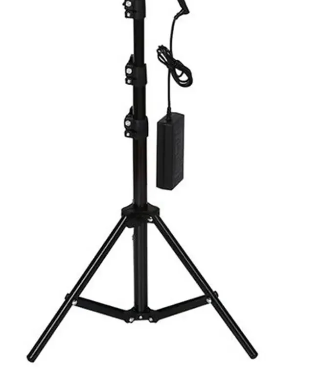 Professional 12-inch LED ring light with tripod and phone mount.